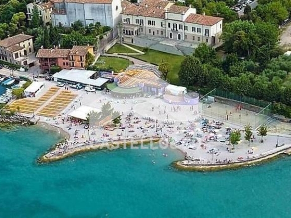 Trilocalino con  solarium vista lago!